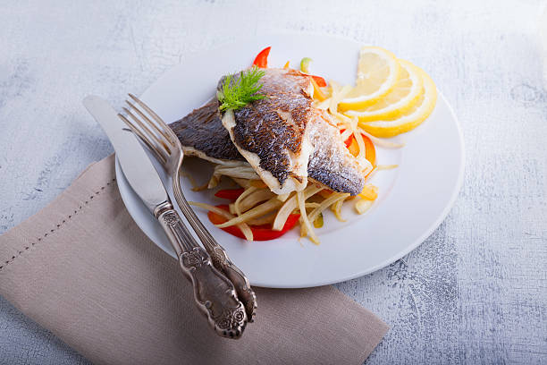 istock Sea Bream fish with vegetables 498422201