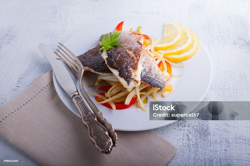 Sea Bream fish with vegetables Fillet of sea bream with fennel and pepper Carrot Stock Photo