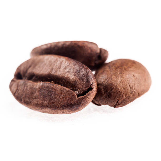 istock Coffee beans isolated on white closeup 498422330