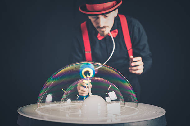 Artist Playing with Soap Bubble stock photo