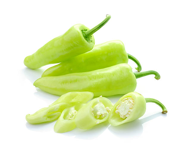 istock Green hot chili pepper on white 498423159
