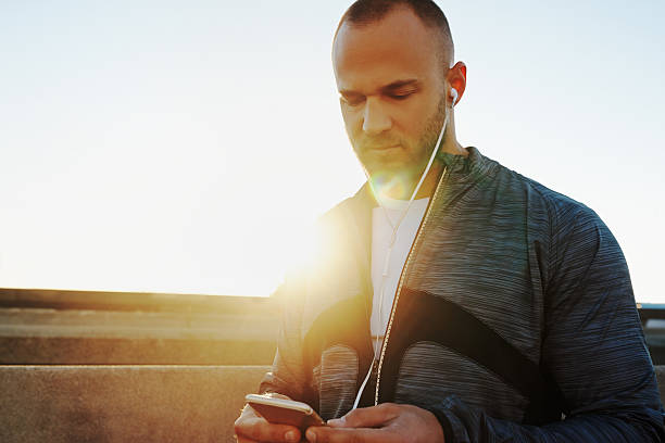 istock Getting psyched for his run with some motivating music 498424172