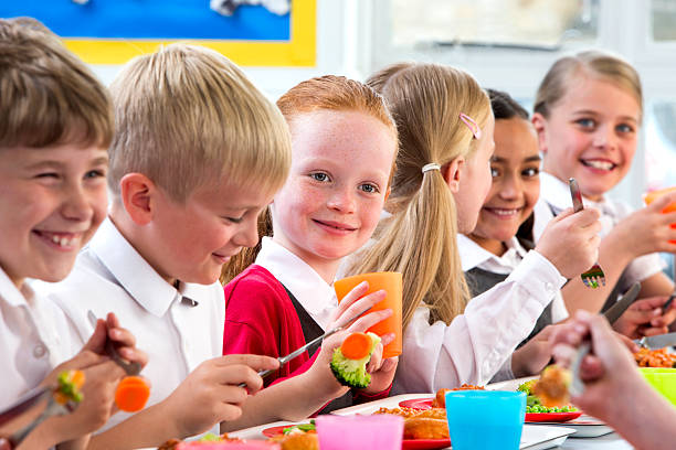 istock Children Eating School Dinners 498424257