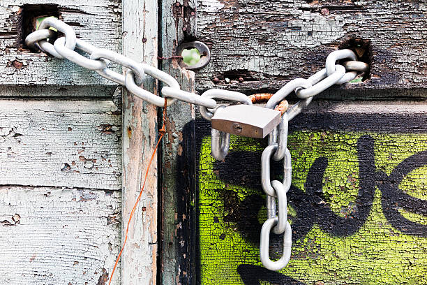 istock Old Door with padlock. Color Image 498424913