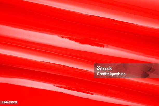 赤い光沢のあるビニールウェーブテクスチャの背景のクローズアップ - からっぽのストックフォトや画像を多数ご用意 - からっぽ, やわらか, カラー画像