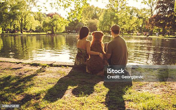 Couple With Dog Stock Photo - Download Image Now - Adult, Animal, Beautiful People