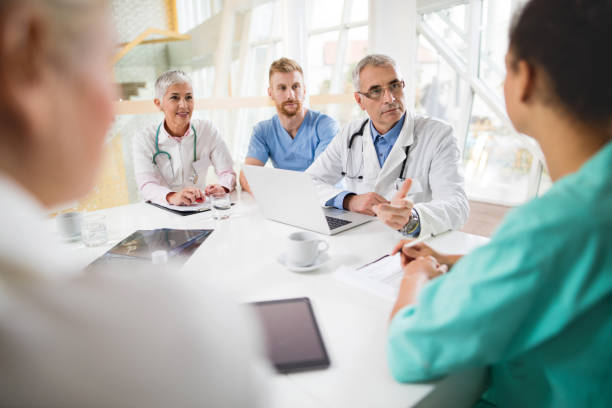 istock Group of medical experts talking on a meeting. 498425896