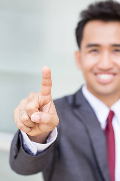 istock Business Man pushing on a touch screen 498425956
