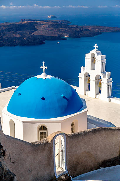 istock Chapel on Santorini Island, blue dome, Greece 498428137