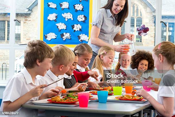 Children Eating School Dinners Stock Photo - Download Image Now - Cafeteria, Child, 6-7 Years