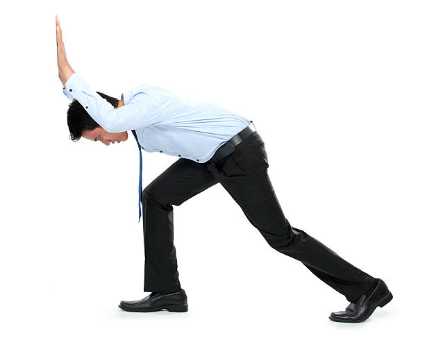 istock Young businessman pushing a blank board 498428771