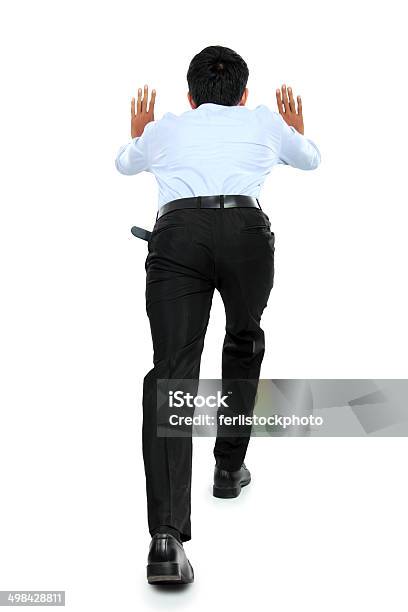 Portrait Of Young Businessman Pushing A Blank Board Stock Photo - Download Image Now