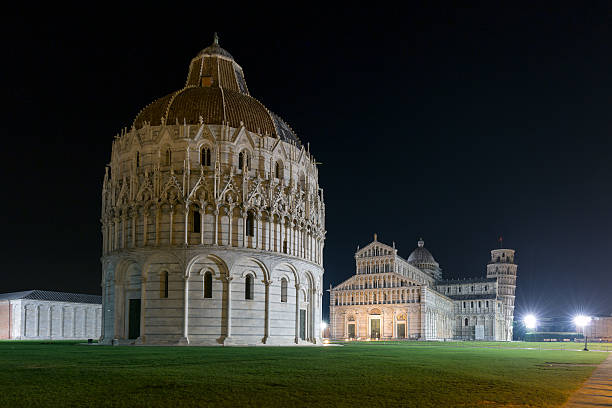 istock Baptistry, cathedral and leaning tower of Pisa at night 498429458