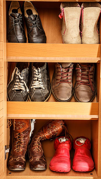 istock Shoes on shelves 498429522