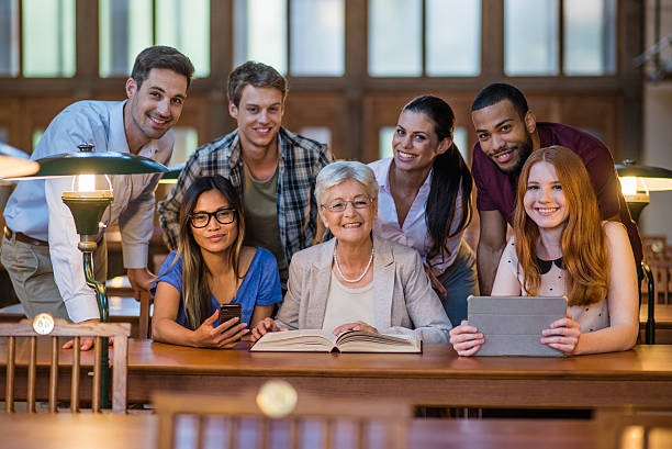 istock Portrait of people in library 498435892