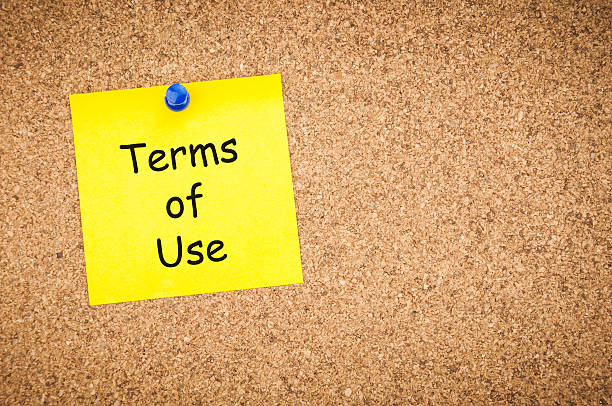 istock sticky note with word terms of use on corkboard 498436116