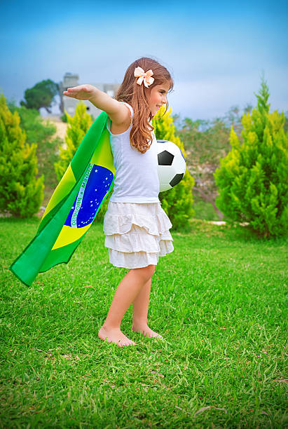 istock Happy little football player 498442697