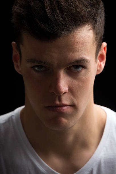 istock Headshot of Young Man 498444879