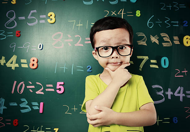 Cute asia children do arithmetic Cute asia children mathematics stock pictures, royalty-free photos & images