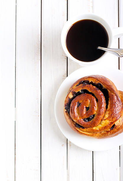istock Bun and cup of coffee 498446311