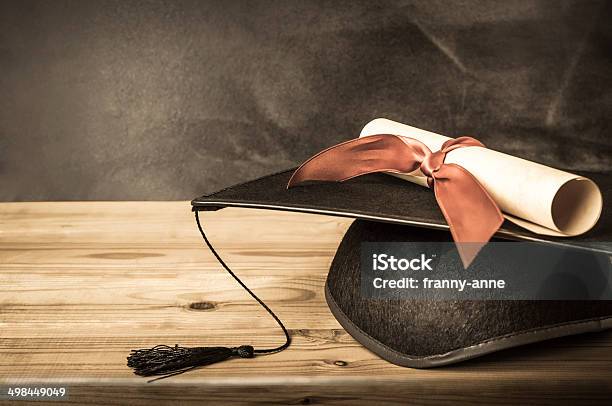 Teachers Desk Graduation Cap Diploma Stock Photo - Download Image Now - Achievement, Adult Student, Award