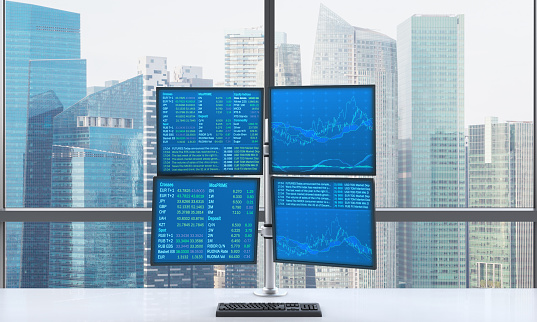 A modern trader's workplace or station which consists of four screens with financial data in a bright modern open space panoramic office. Singapore panoramic view. Forex. 3D rendering.