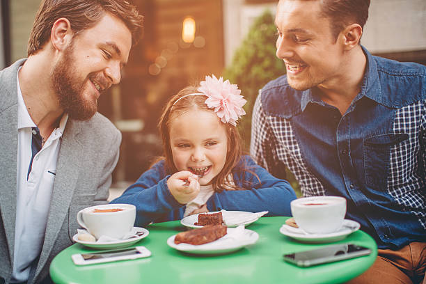 istock Gay Parents with daughter 498452828
