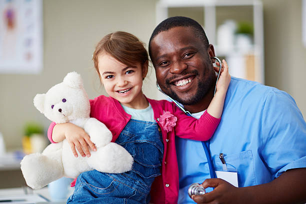 istock Little patient and doctor 498454154