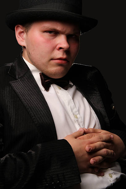 istock the young nice man in a black tuxedo 498454346