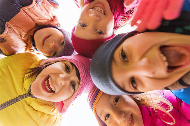 istock group of happy children faces in circle 498455514