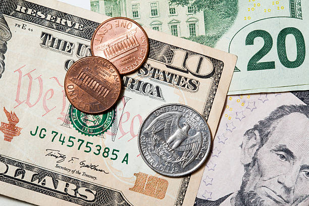 american money ten,twenty,five dollar bill and coins minimum wage stock pictures, royalty-free photos & images