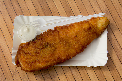 Dutch street food deep fried fillet of haddock with remoulade