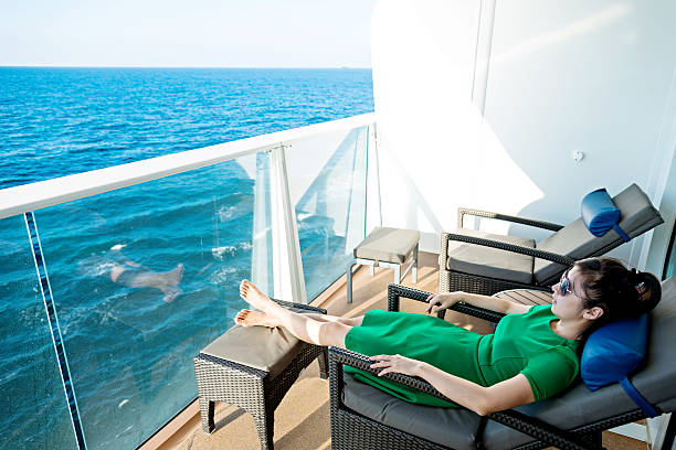 Young asian woman relaxing on cruise.