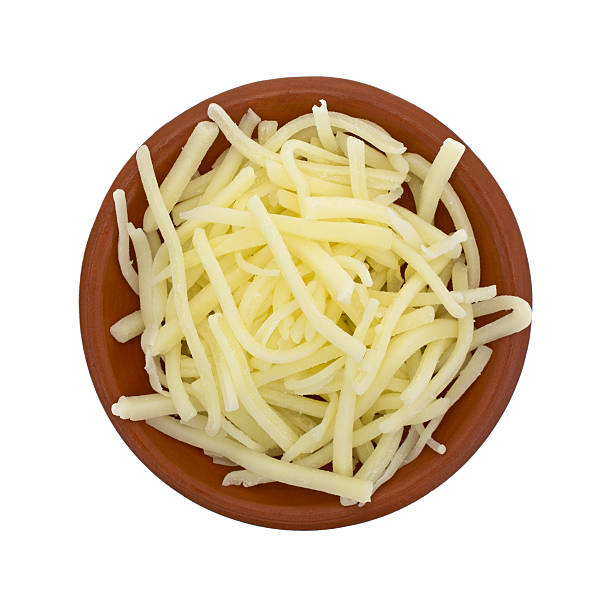 istock Portion of natural white mild cheddar cheese in bowl 498461196