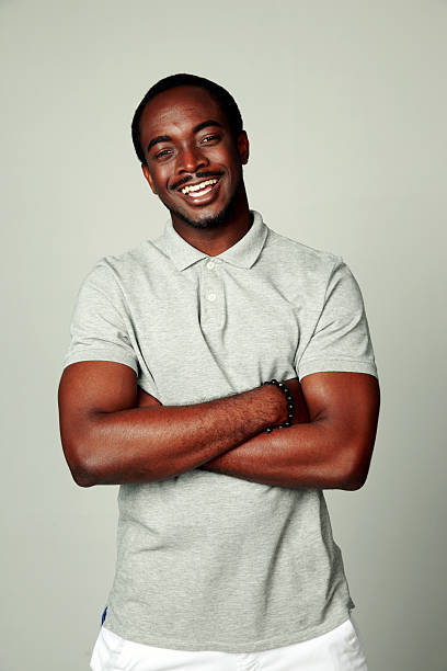 istock Happy african man with arms folded 498462573