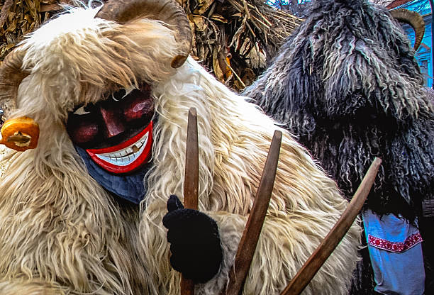 Hungarian "Buso" Demons at the Mohács Festival in Hungary Men dressed up as demons for the annual "Buso" festival in Mohacs, HUngary painted masquerade masks stock pictures, royalty-free photos & images