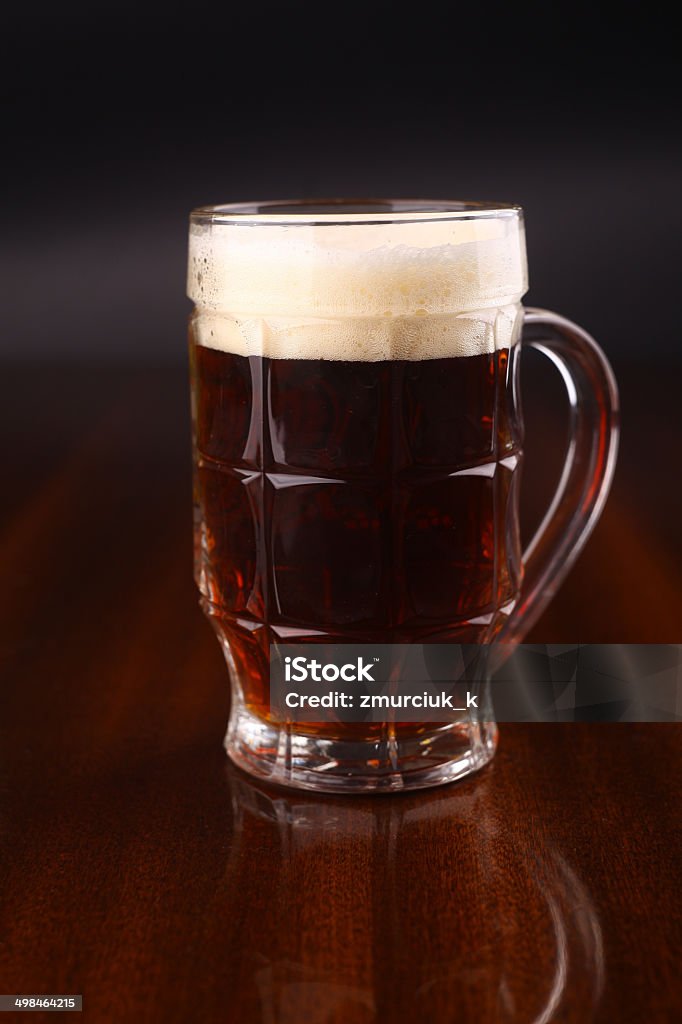 Glass of beer Mug of dark beer over a dark background Alcohol - Drink Stock Photo