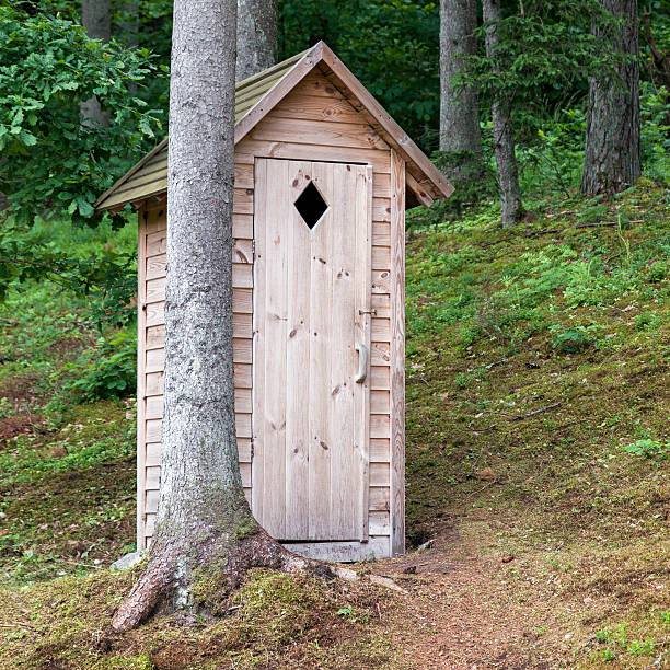 istock Wooden outdoors toilet 498465117