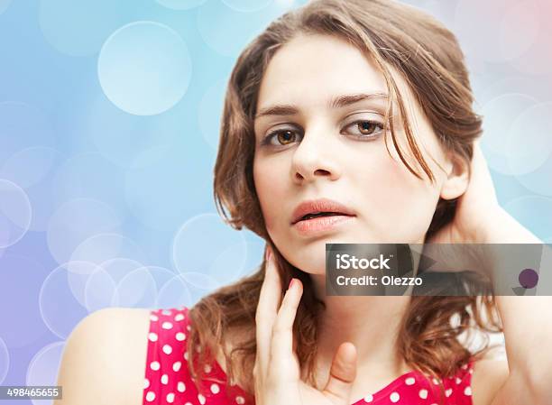 Surprised Beautiful Young Woman On Multicolored Background Stock Photo - Download Image Now