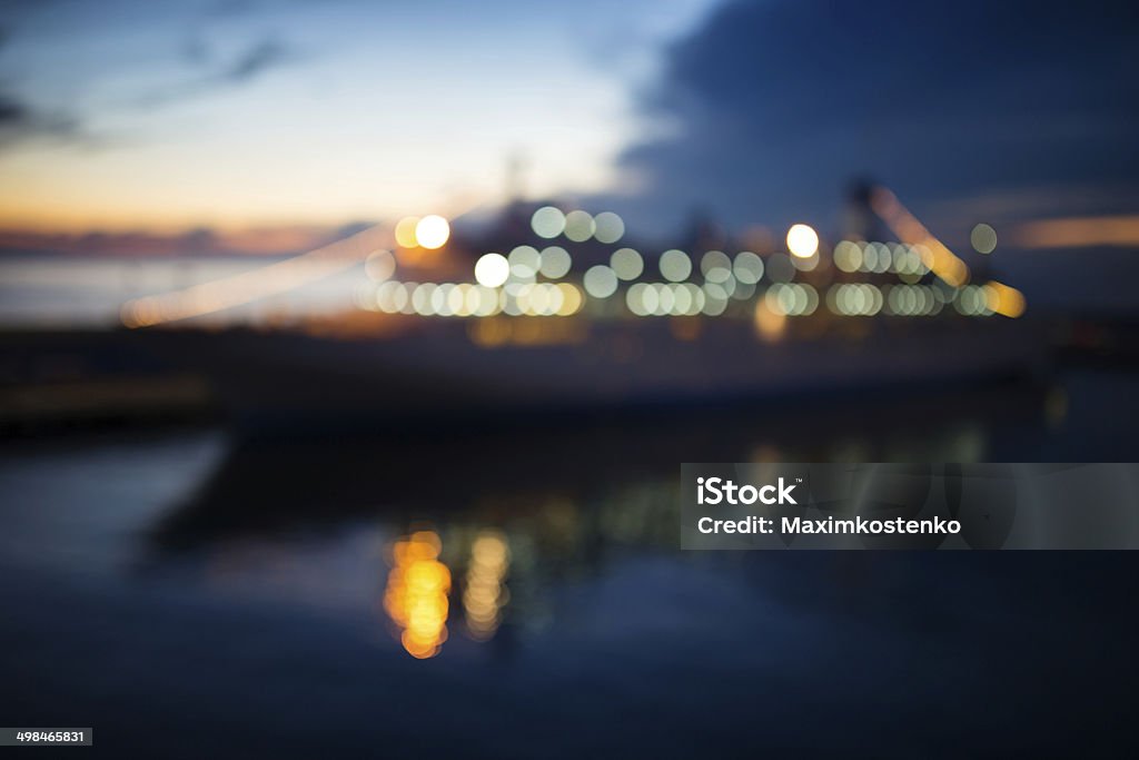 Cruise liner in the harbor at night. Defocused photo Blue Stock Photo