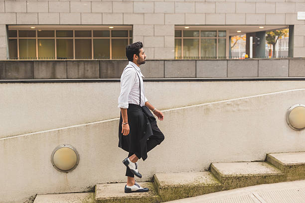 istock Handsome Indian man posing in an urban context 498466190