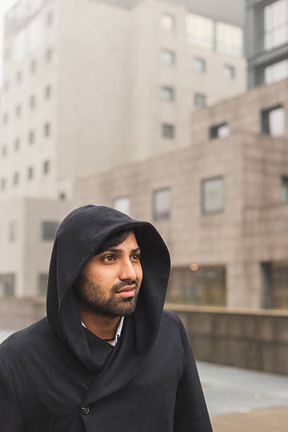 istock Handsome Indian man posing in an urban context 498466340