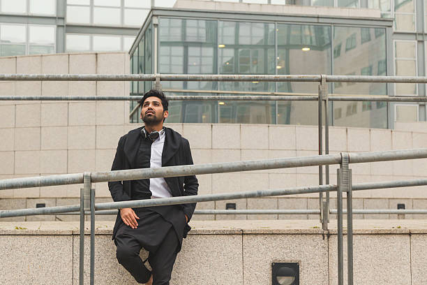 istock Handsome Indian man posing in an urban context 498467034