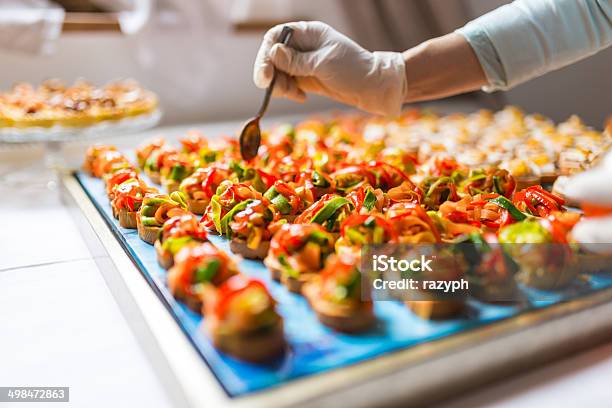 Final Touch For Tasty Canapes Stock Photo - Download Image Now - Food Service Occupation, Food And Drink Industry, Food