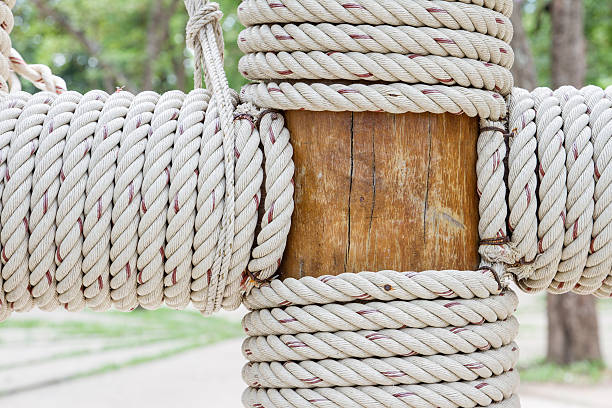 istock Rope tied around wooden pillar 498474323