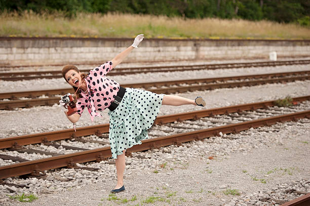 istock Retro Female Photographer 498476945