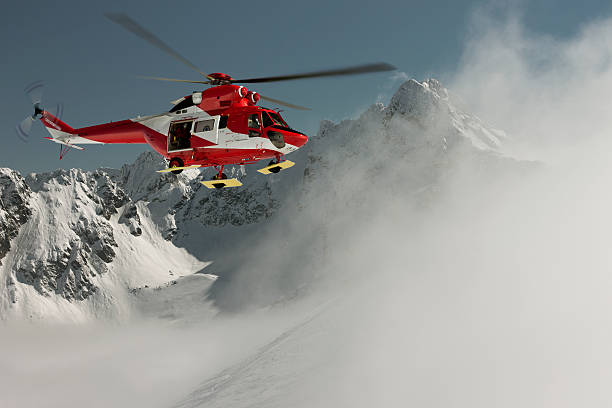 Volunteer Mountain Rescue Service Helicopter mountain rescue action in the Tatra National Park avalanche stock pictures, royalty-free photos & images