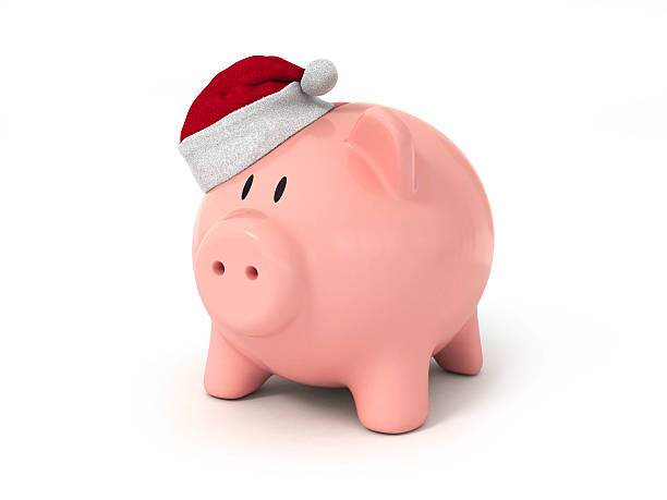 istock Pig piggy bank in a Christmas hat 498490700