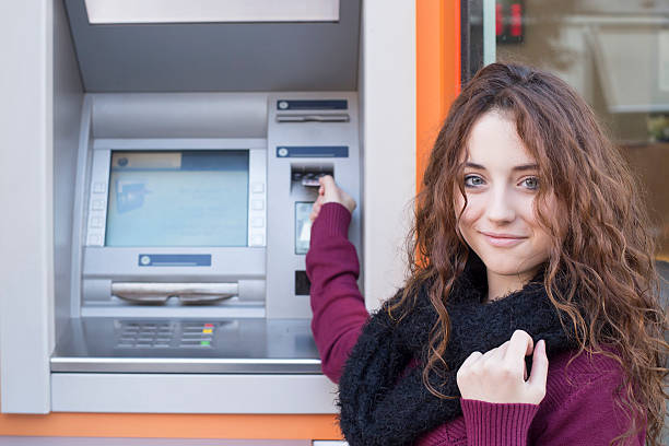 inserting a credit card to ATM