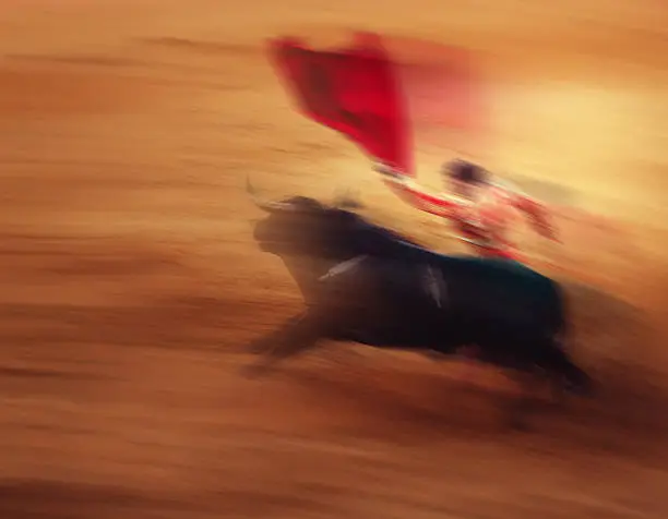 Bull and Matador, Bullfighting abstract - motion blur effect